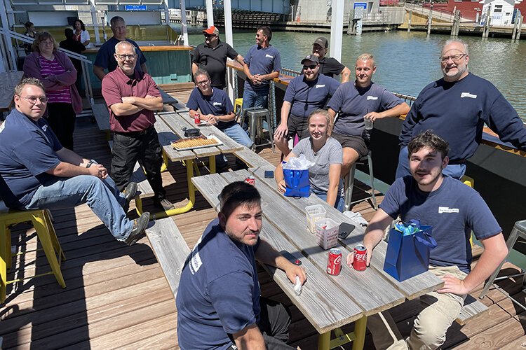 Blue Water Controls team photo relaxing at CityFlatsHotel in Port Huron.