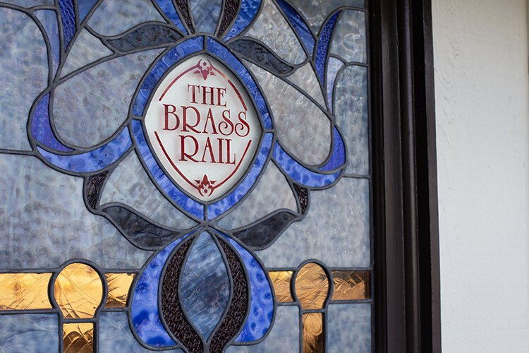 As part of the charm of the Brass Rail Bar, numerous stained glass artworks are original to the establishment.