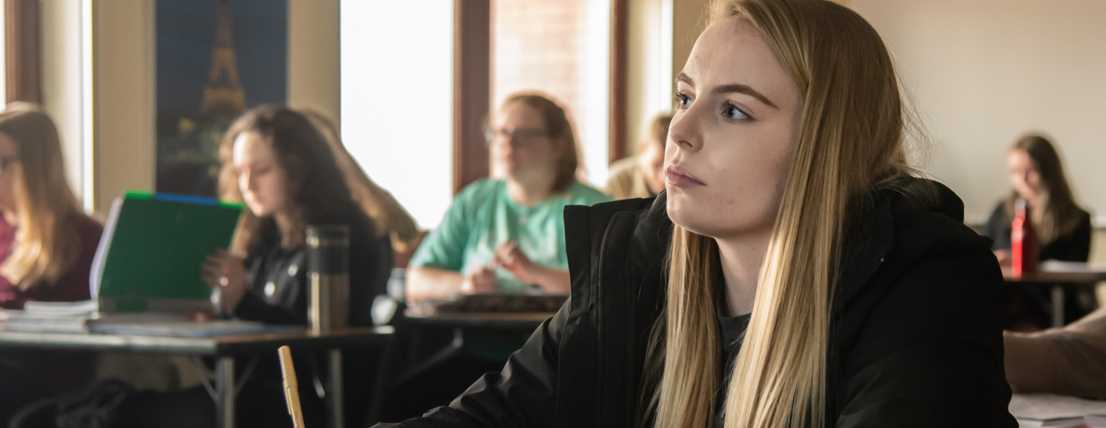 Anna Dalessandro listens intently during French class.