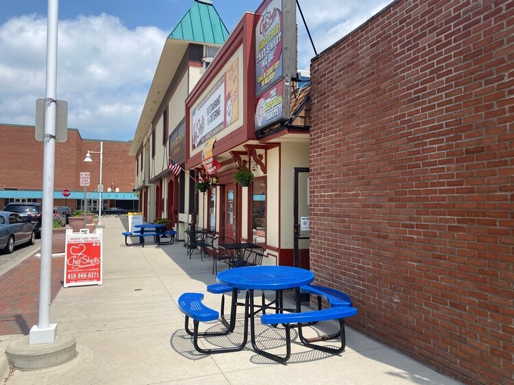 A picnic table outside of Chef Shell's Restaurant & Catering