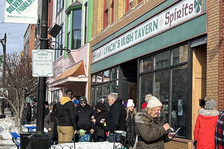 Visitors line up to sample chili at Lynch's Irish Tavern during the Port Huron ChillyFest's Chili Crawl.