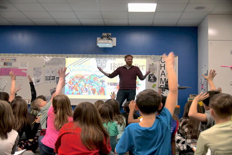 Dillon Barr speaks to a group of students during one of his classroom visits.