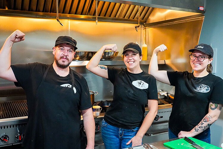 Owner of Doña Marinas, Heather Fagan (center), poses for a photo with her employees Martin Lee and Alexandra Hand.