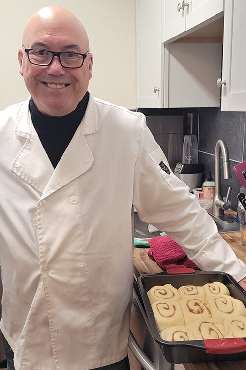 Joe Benoit works in the kitchen at Lexington House Bed & Breakfast.