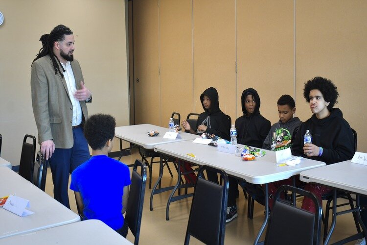 Josh Chapman with Voices of Youth kids.