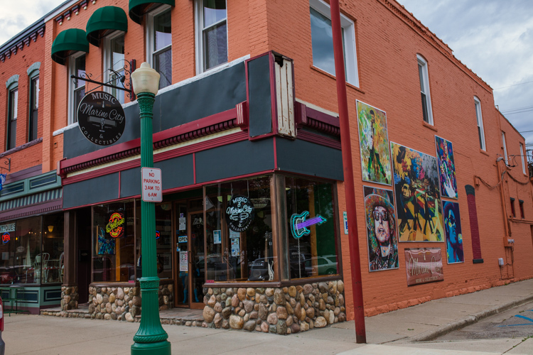 Inviting storefronts encourage shoppers to patronize stores like Marine City Music & Collectibles