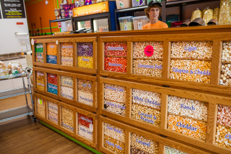 Bright and colorful popcorn draws the attention of passersby into  Popcorn Paradise in Marine City.