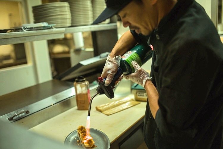 A chef prepares sushi at Blackfish.