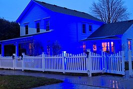 Residents in St. Clair County are lighting up their homes in blue to celebrate autism awareness