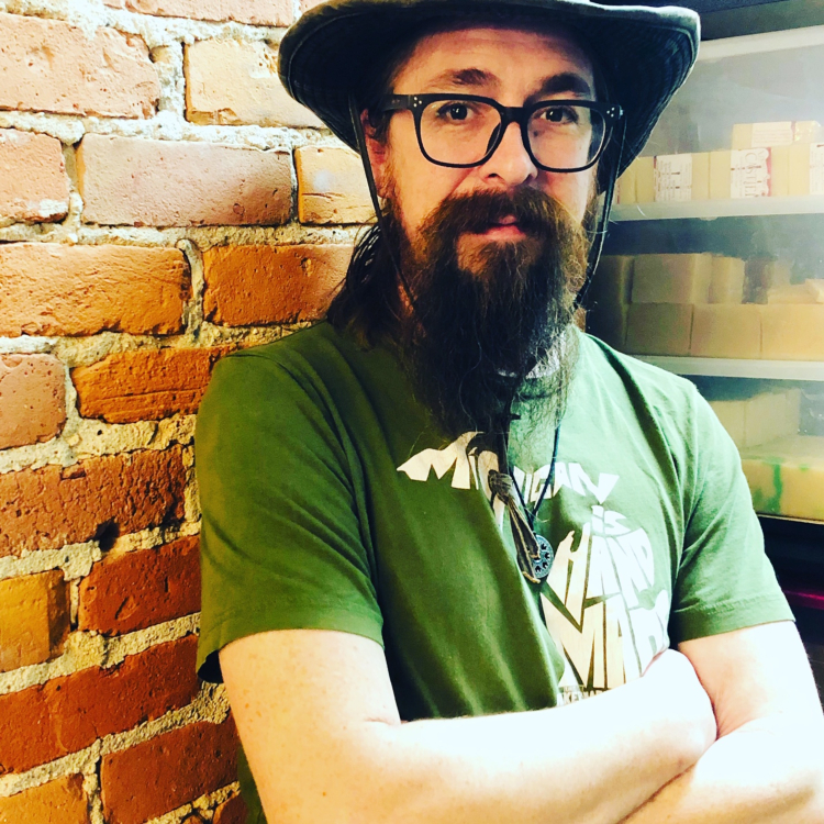 Lou Bowers handcrafts soap at Lounies Soap Co.