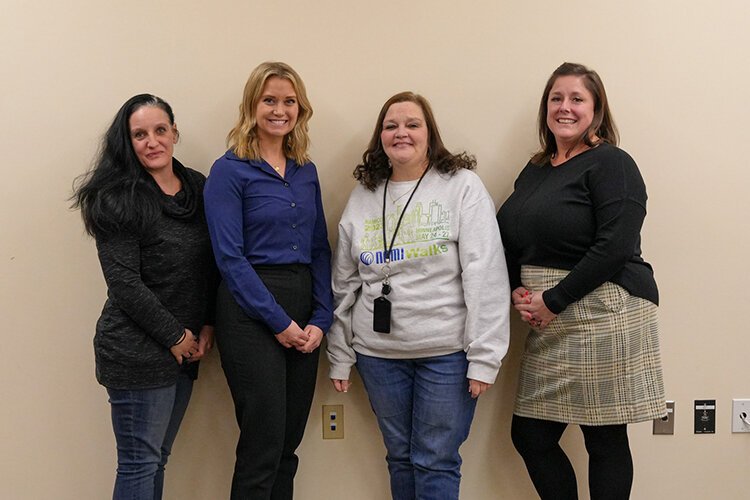 NAMI Blue Water Area Board (from left) Secretary Laura Bramlett, President Tori Ferres, Vice President Lisa K. Arnett, and Treasurer Emily Uppleger.