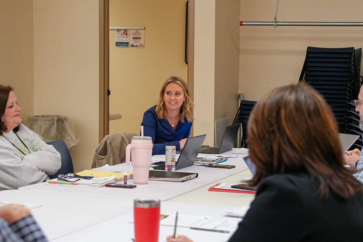 Tori Ferres, President of NAMI Blue Water Area, leads the monthly NAMI meeting to discuss outreach activities and trainings the group can provide to the community.