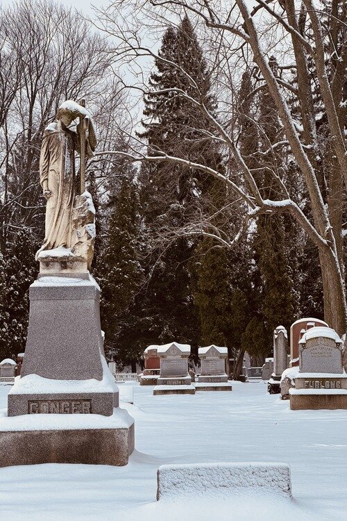 A snowy solitude at Our Lady of Mount Carmel Cemetery in Kenockee Township.