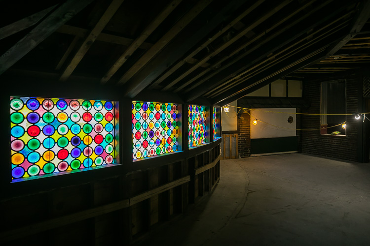 Beautiful stained class adorns the walls of the St. Clair Inn