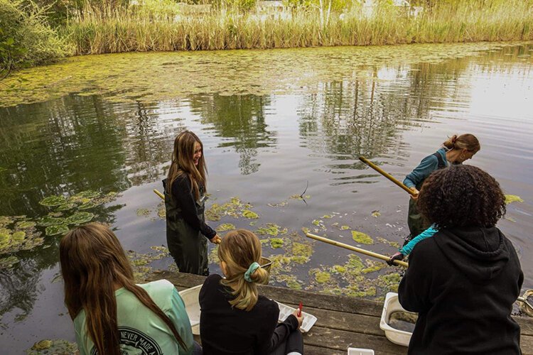 Students in Nikki DeGowske's class at Algonquin Elementary School receive hands-on learning of nature and wildlife.