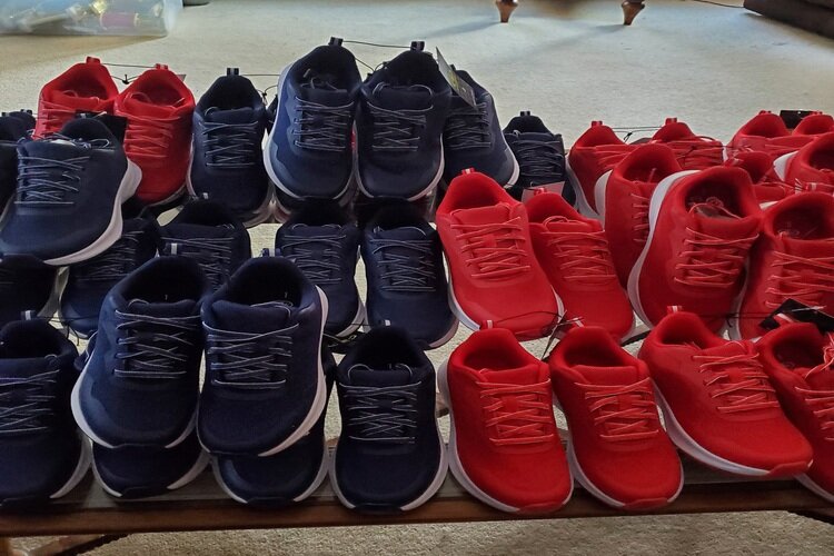 Tires and Treads Community Project operates inside the home of Fran Morris where she gathers clothes and shoes for children in need.