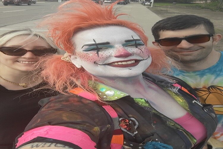 Elaina (left) and Tom (right) Turner with Trash the Clown.