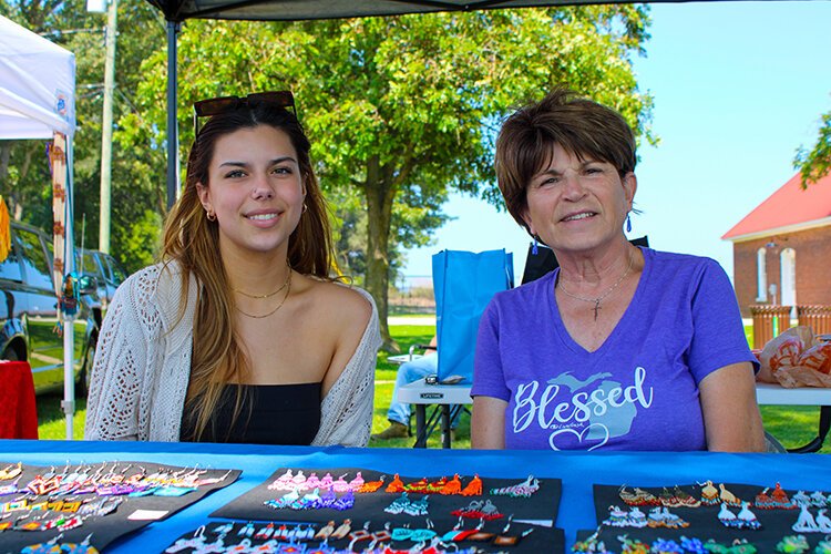 Kiley (left) and Dorothy of Beaded Earrings, one of the several vendors present at this year's Blue Water Traditional Pow-Wow.