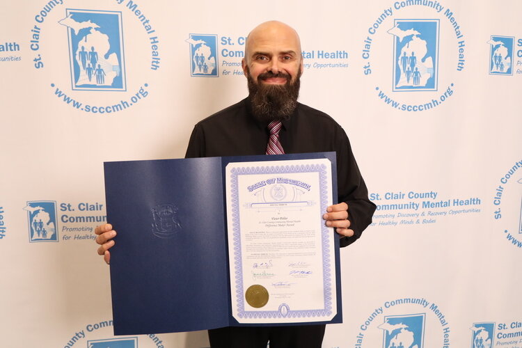 U.S. Marine Corps Veteran and SCCCMH Veteran Peer Support Specialist Victor Polito receives the inaugural Difference Maker Award for relentless dedication to helping fellow veterans find hope and healing.