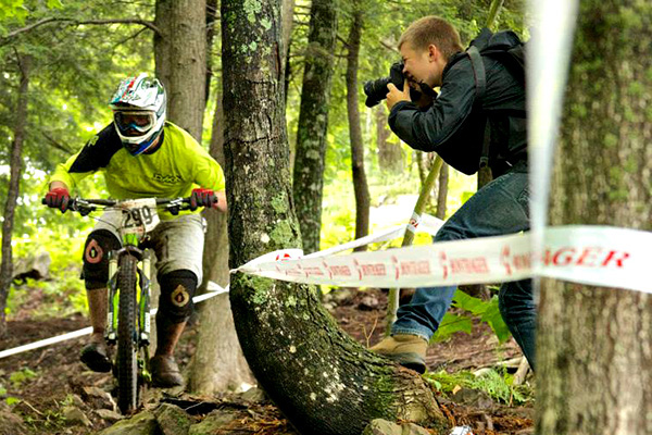 Clear & Cold Cinema member Ryan Stephens shoots photos and video of a mountain bike race for an upcoming project