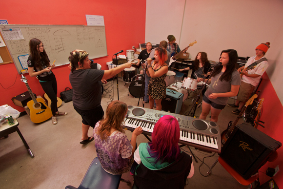 MFAK brings kids together in groups to play music.