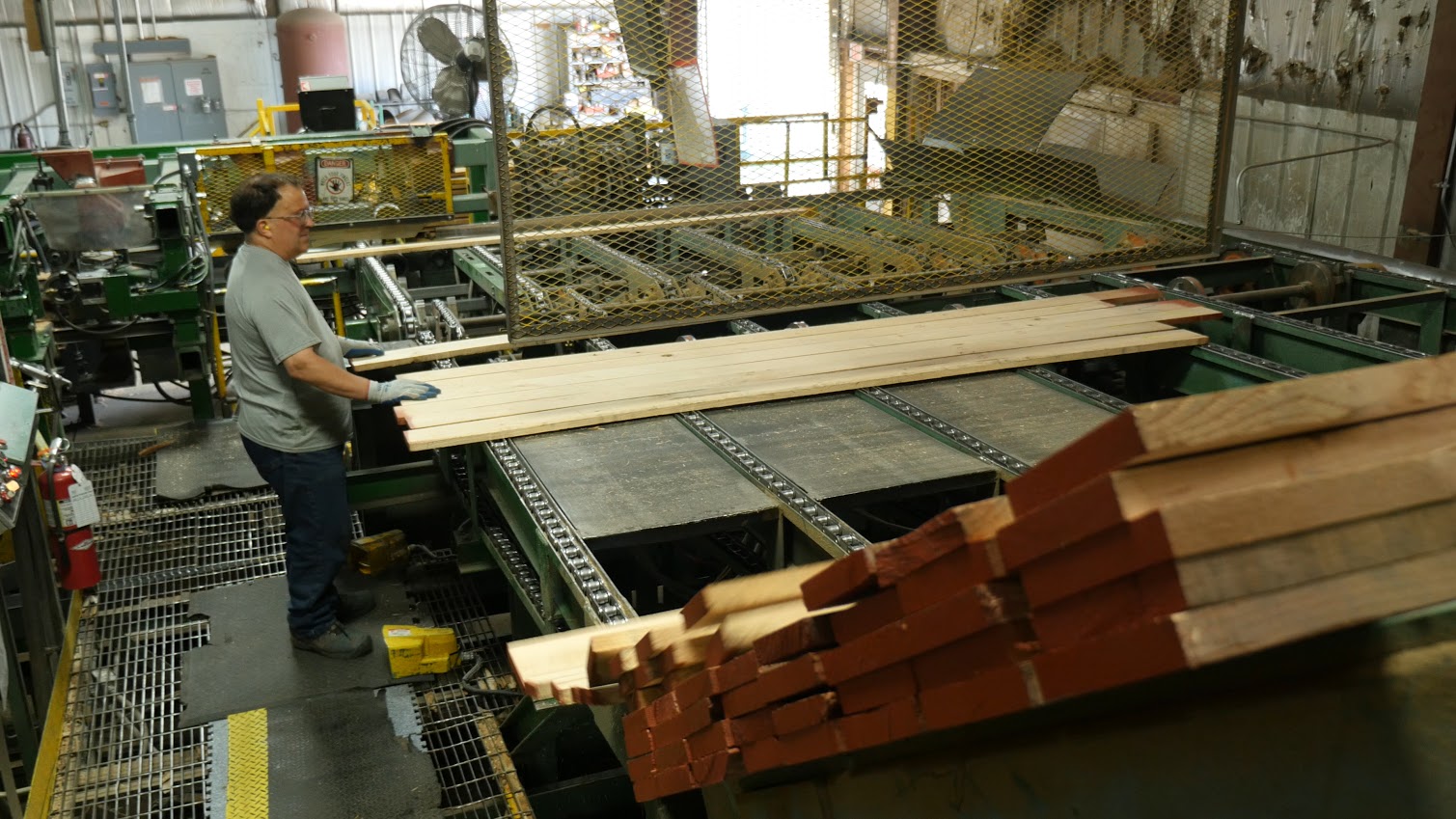 Employees of Connor Sport Court in Amasa carefully craft Northern hard maple for the Boston   Celtics’ famed parquet floor. (photo courtesy Nick Jensen/Floline Media)