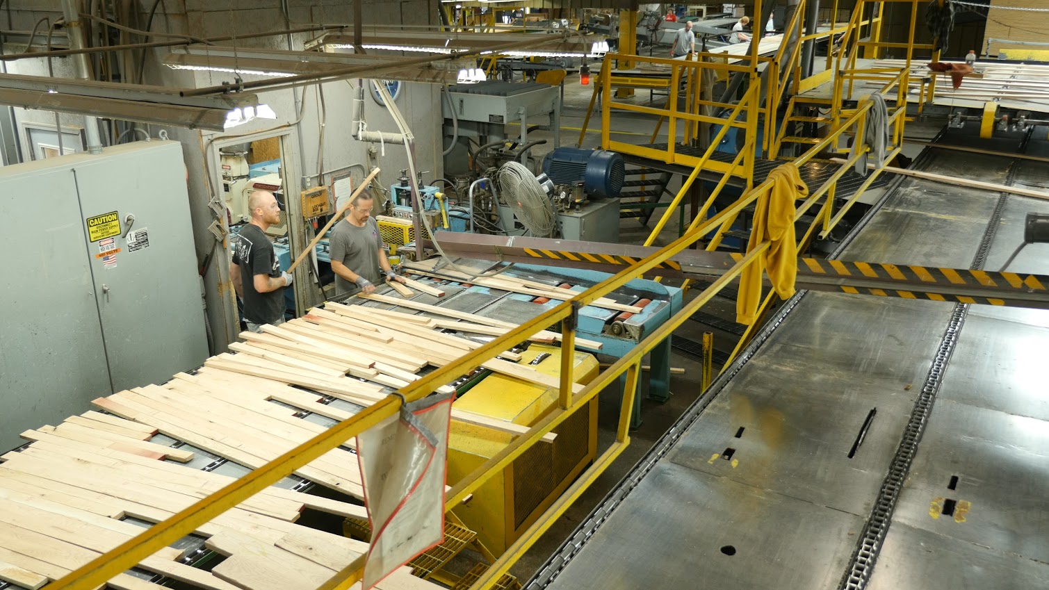 Employees of Connor Sport Court in Amasa carefully craft Northern hard maple for the Boston   Celtics’ famed parquet floor. (photo courtesy Nick Jensen/Floline Media)