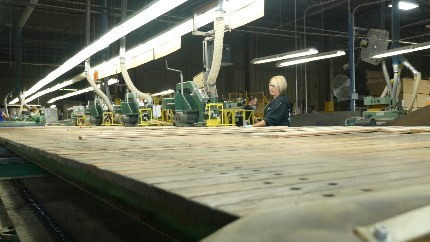 Employees of Connor Sport Court in Amasa carefully craft Northern hard maple for the Boston   Celtics’ famed parquet floor. (photo courtesy Nick Jensen/Floline Media)