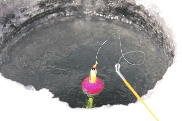ice fishing at one of the many inland lakes in the Hiawatha National Forest