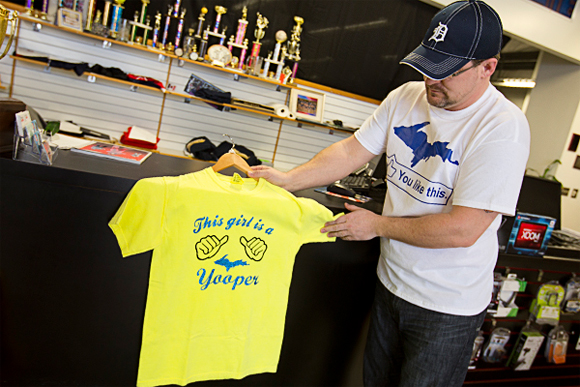 Scott Martin shows off some Yooper pride apparel. / Shawn Malone