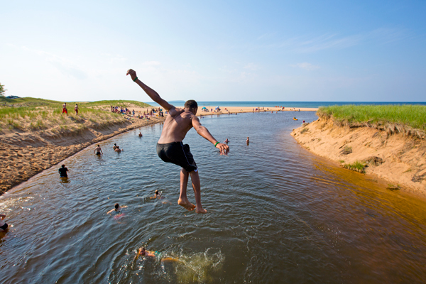 Taking the plunge at the Autrain River mouth I Shawn Malone