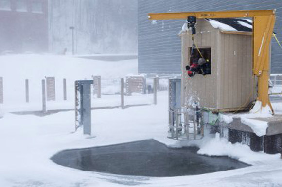 Research under ice on the Portage Canal in Houghton.