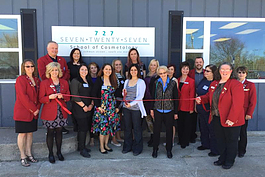 Danielle Eggert cuts the ribbon on her 727 School of Cosmetology.