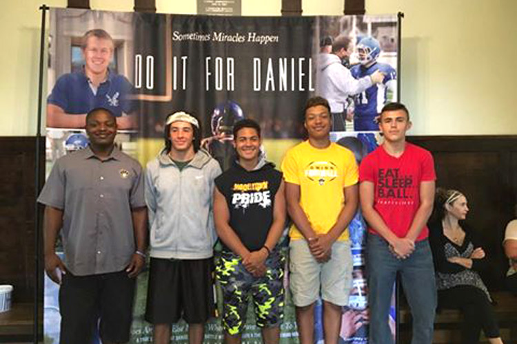 Gwinn Modeltowners football players and Coach Dion Brown at the recent Do It For Daniel screening.