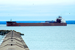 An ore carrier pushes into Marquette. 