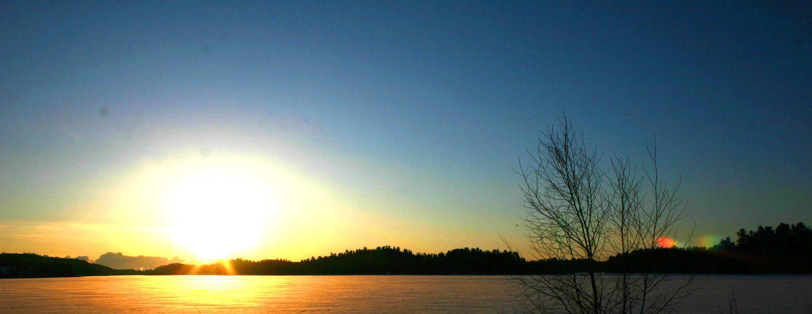 A sunrise over Deer Lake. 