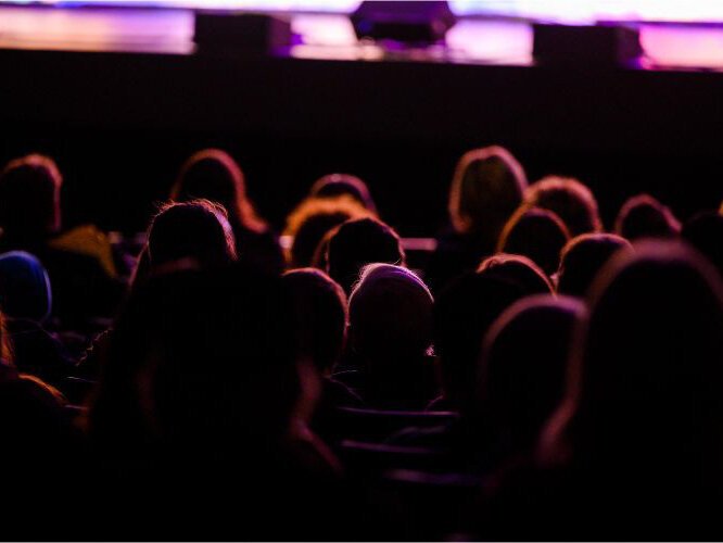 The audience at a production of "Hairspray" at the Rozsa.