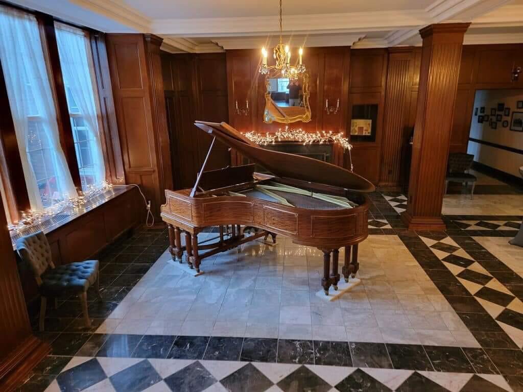 The lobby piano, a Starr Concert Grand Piano, was manufactured in July 1909. The piano Duke Ellington used to compose the movie soundtrack is no longer at The Mather.