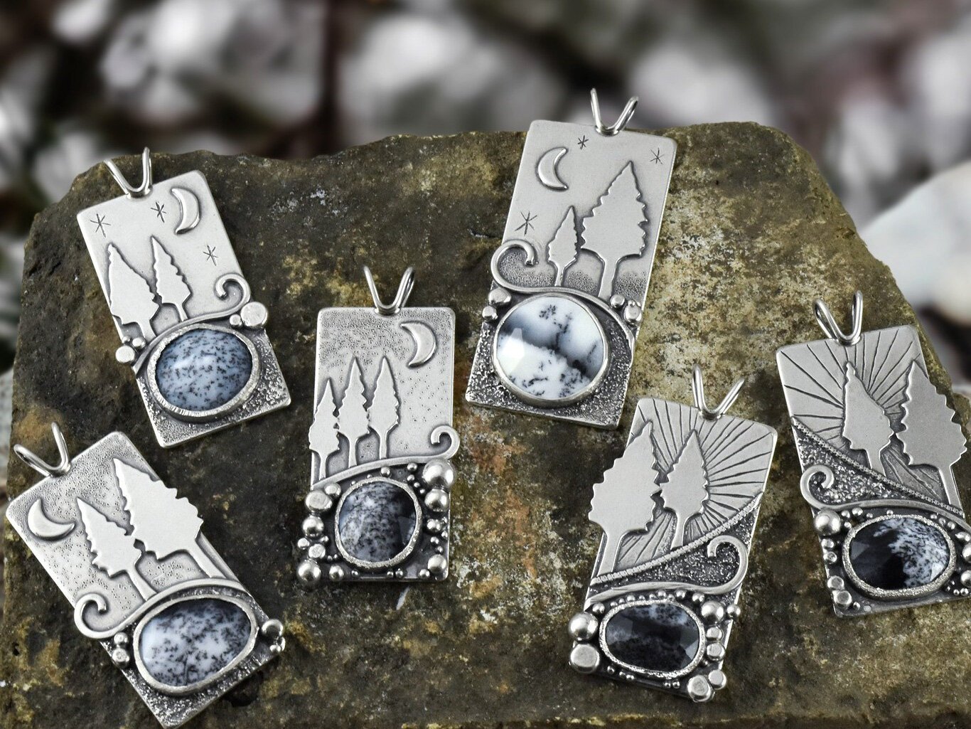 Her nature-inspired work includes these pendants.