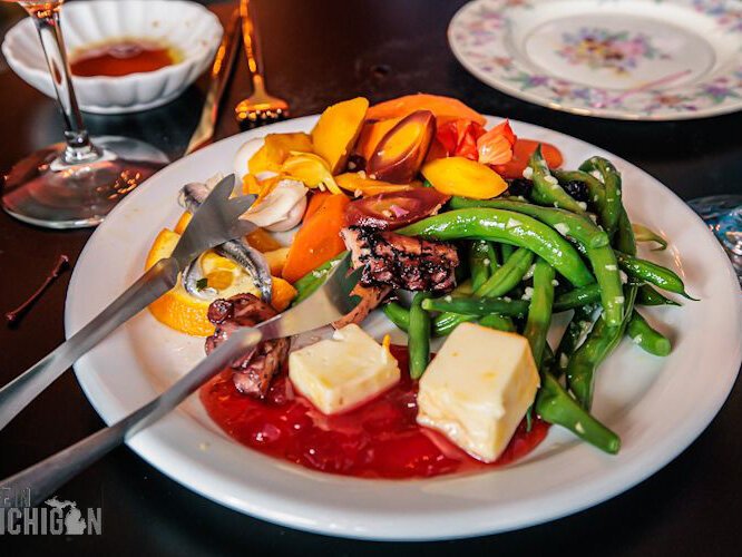 An antipasto course with grilled octopus (a signature dish), cheese with local jam, marinated vegetables and quail eggs.