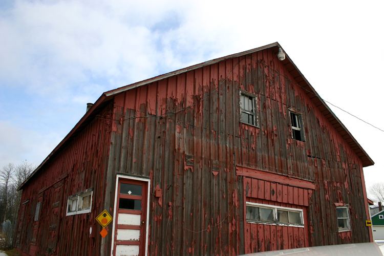 This building has stood next to the Manistique River for generations. 