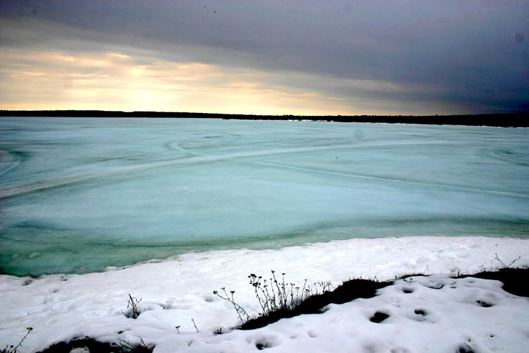 A frozen and chilly Torch Lake. 
