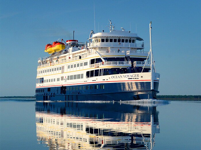 The Ocean Voyager sets sail on one of the many cruises offered by American Queen Voyages.